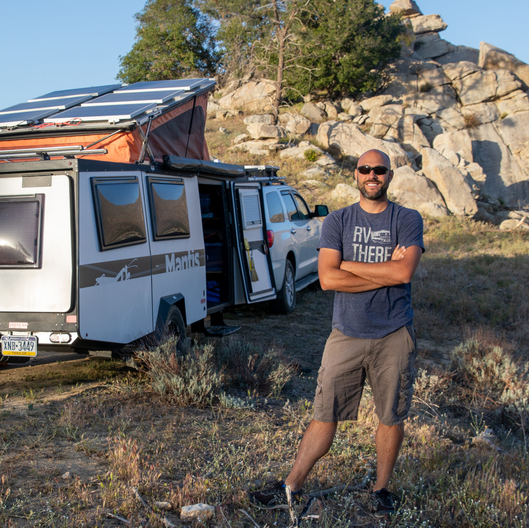 Nick standing in front of Taxa Mantis trailer